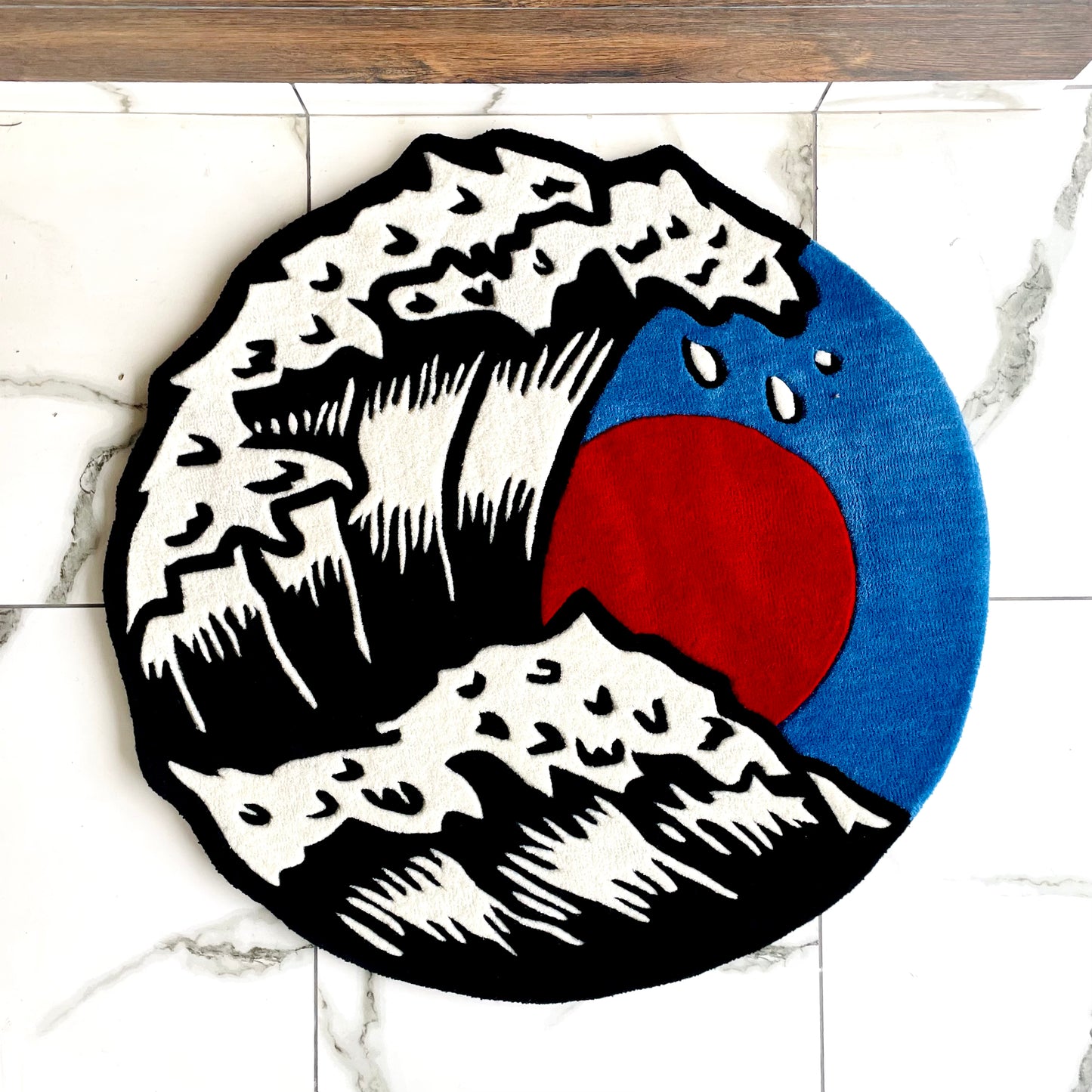 Top view of Great Wave Off Kanagawa Hand-Tufted rug showing the wave crisp finishing