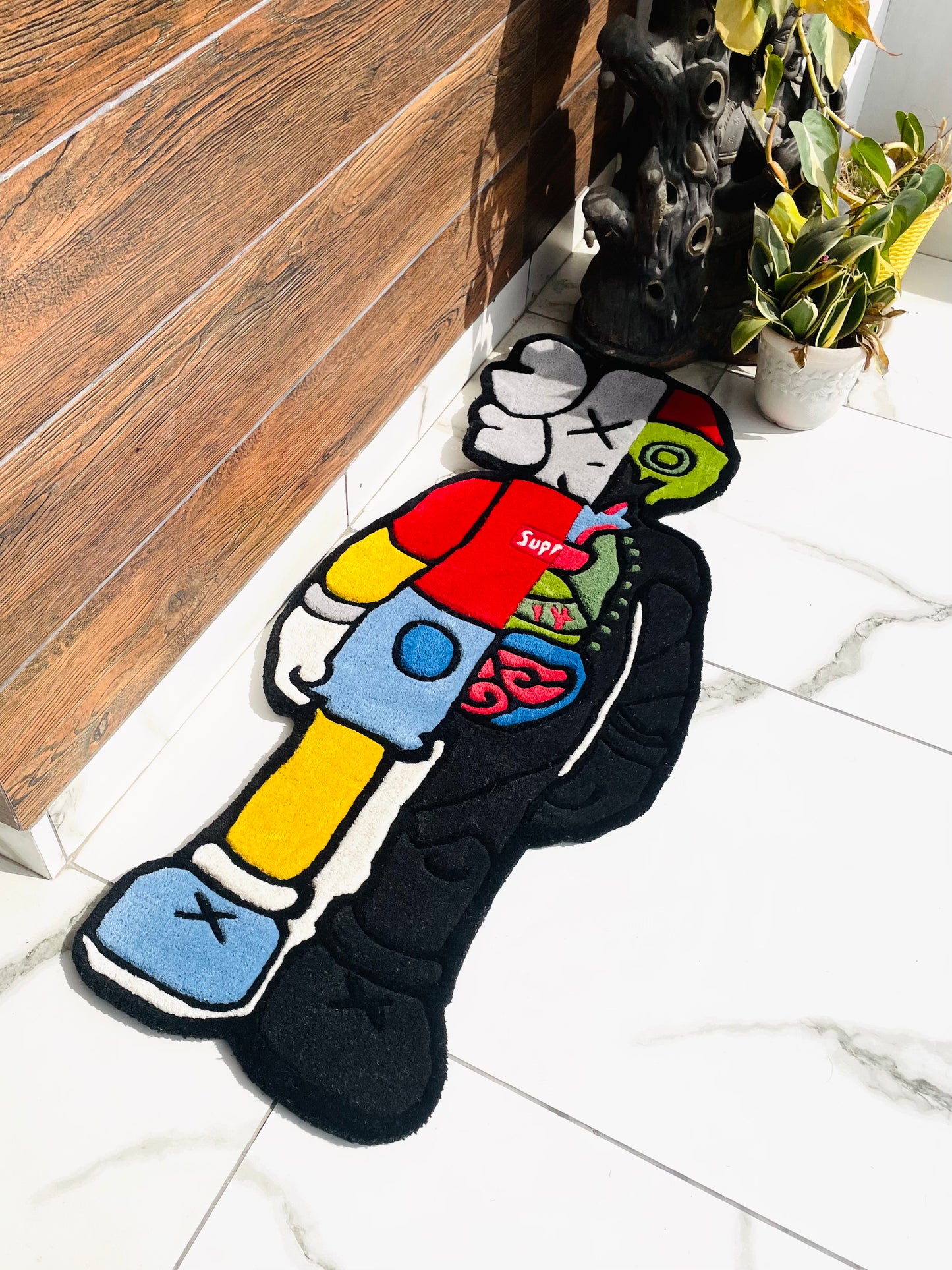Kaws Dissect x Supreme Hand-Tufted Rug low angle view