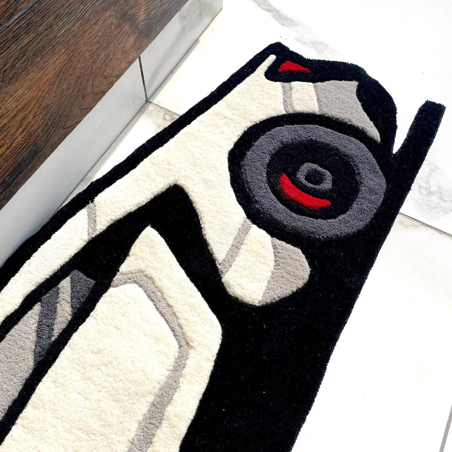 Hand-tufted Lykan HyperSport rug capturing supercar's back profile and luxury automotive aesthetics