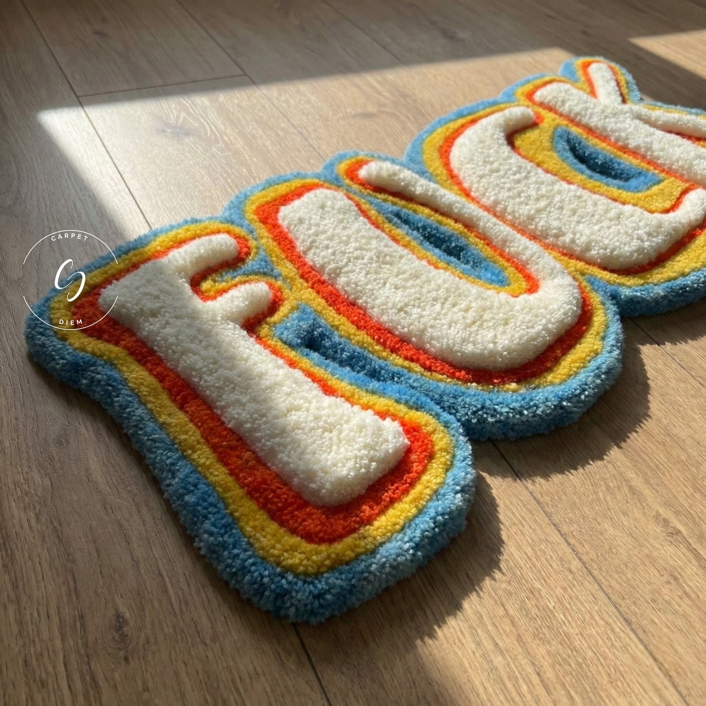 closeup of fuck rug with 3d tufted design 