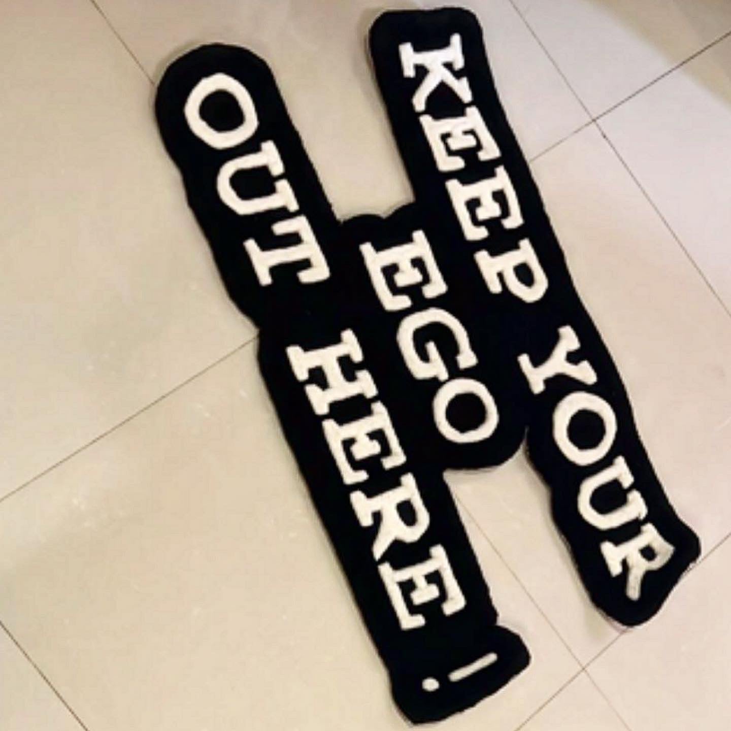 keep your ego out here tufted rug