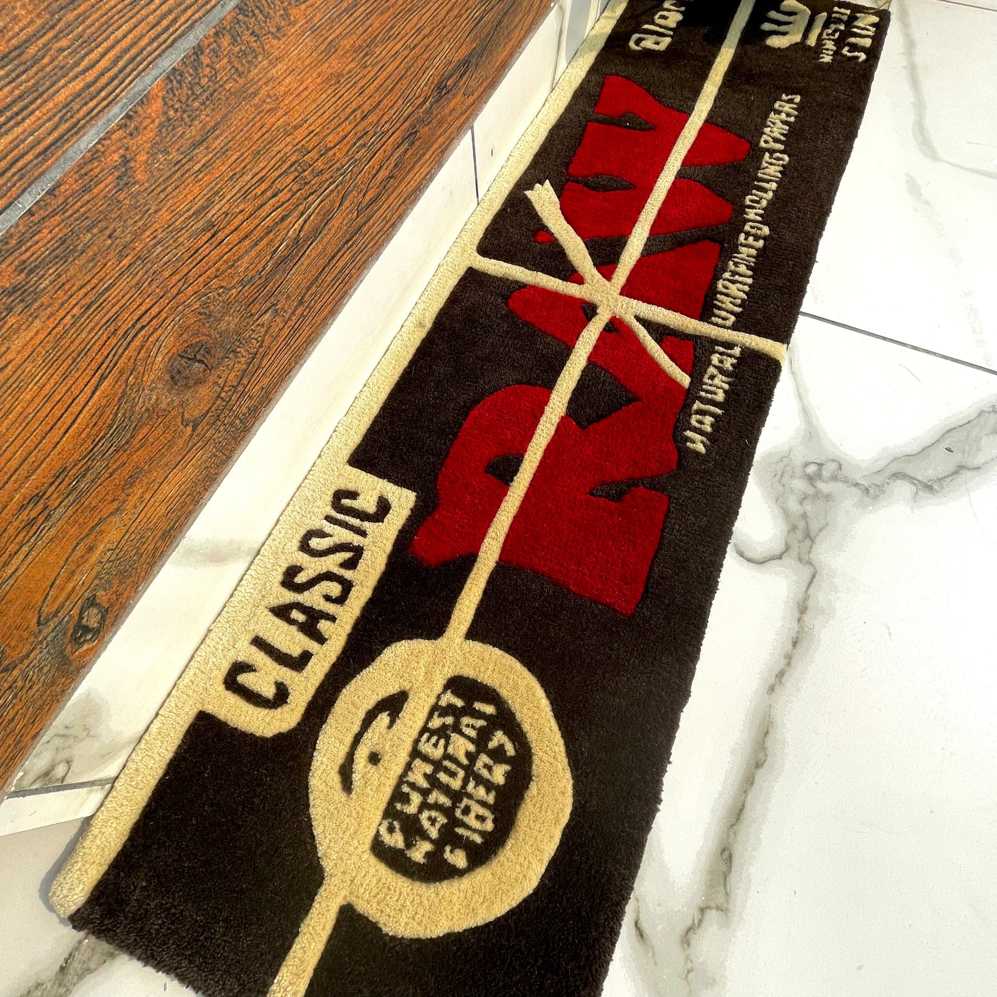 Raw Rolling Papers Hand-Tufted Rug closeup