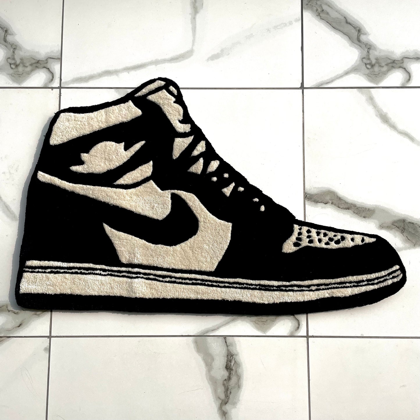 Black Air jordan rug top view