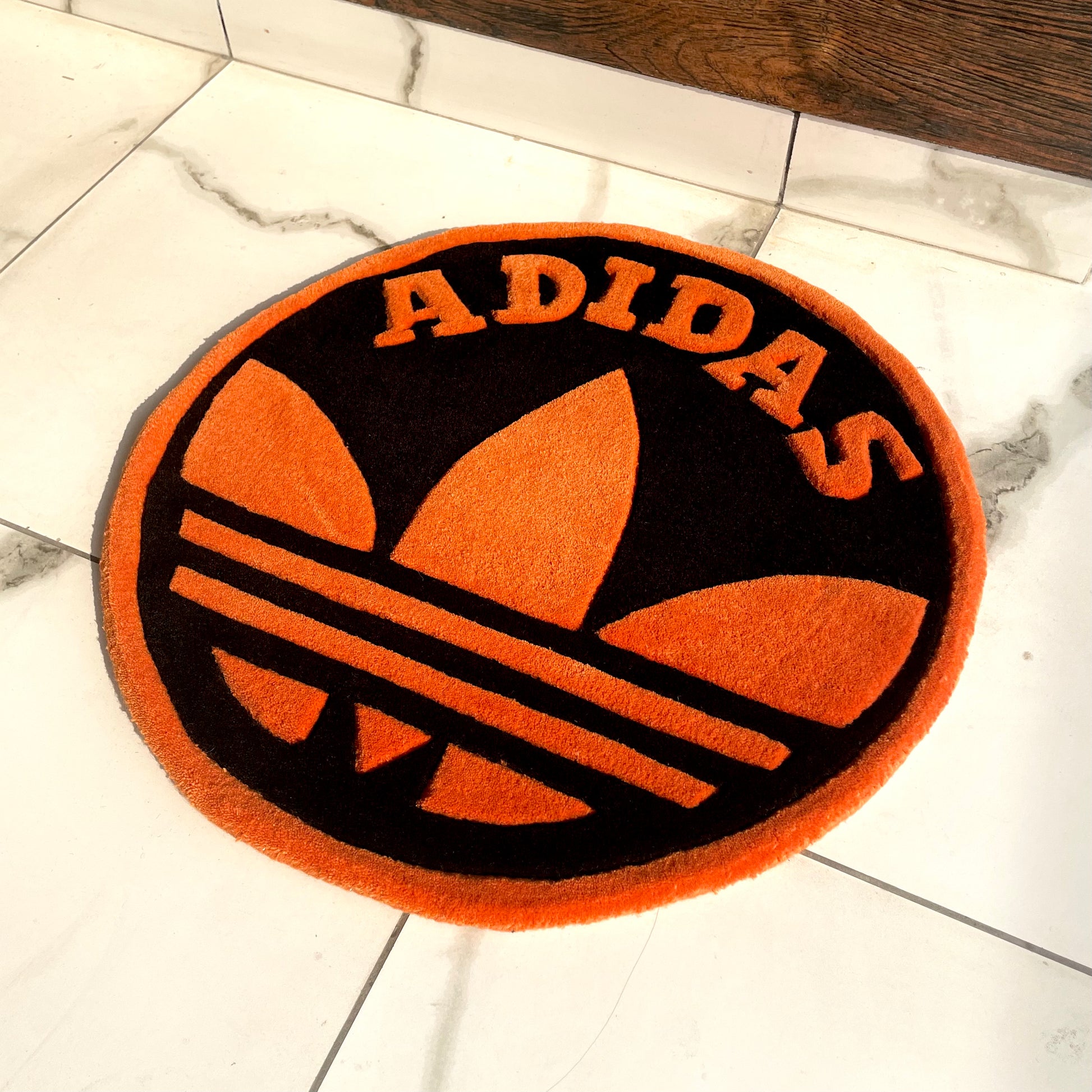 Orange 2024 adidas logo
