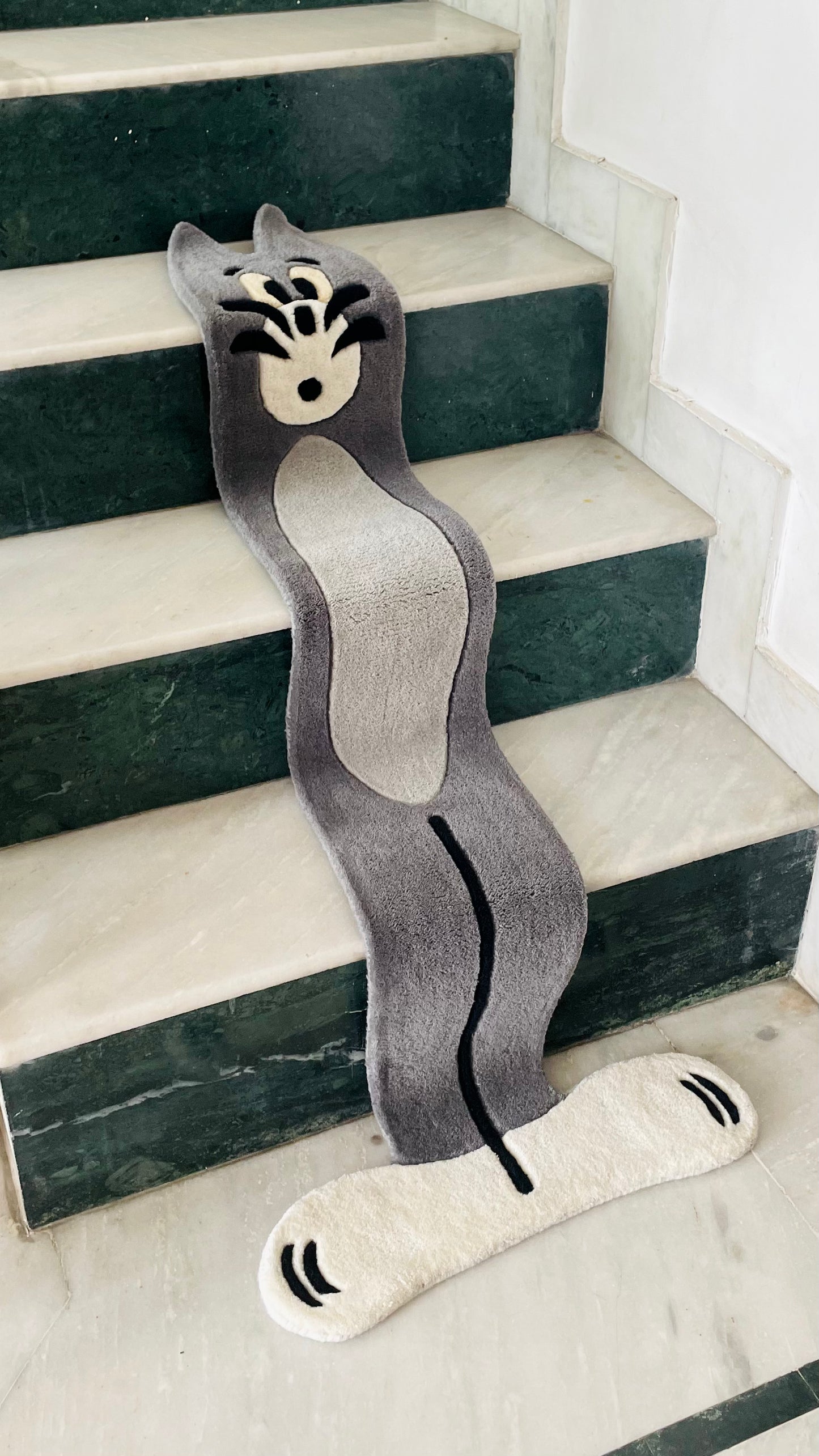 Flat Tom on Stairs Rug