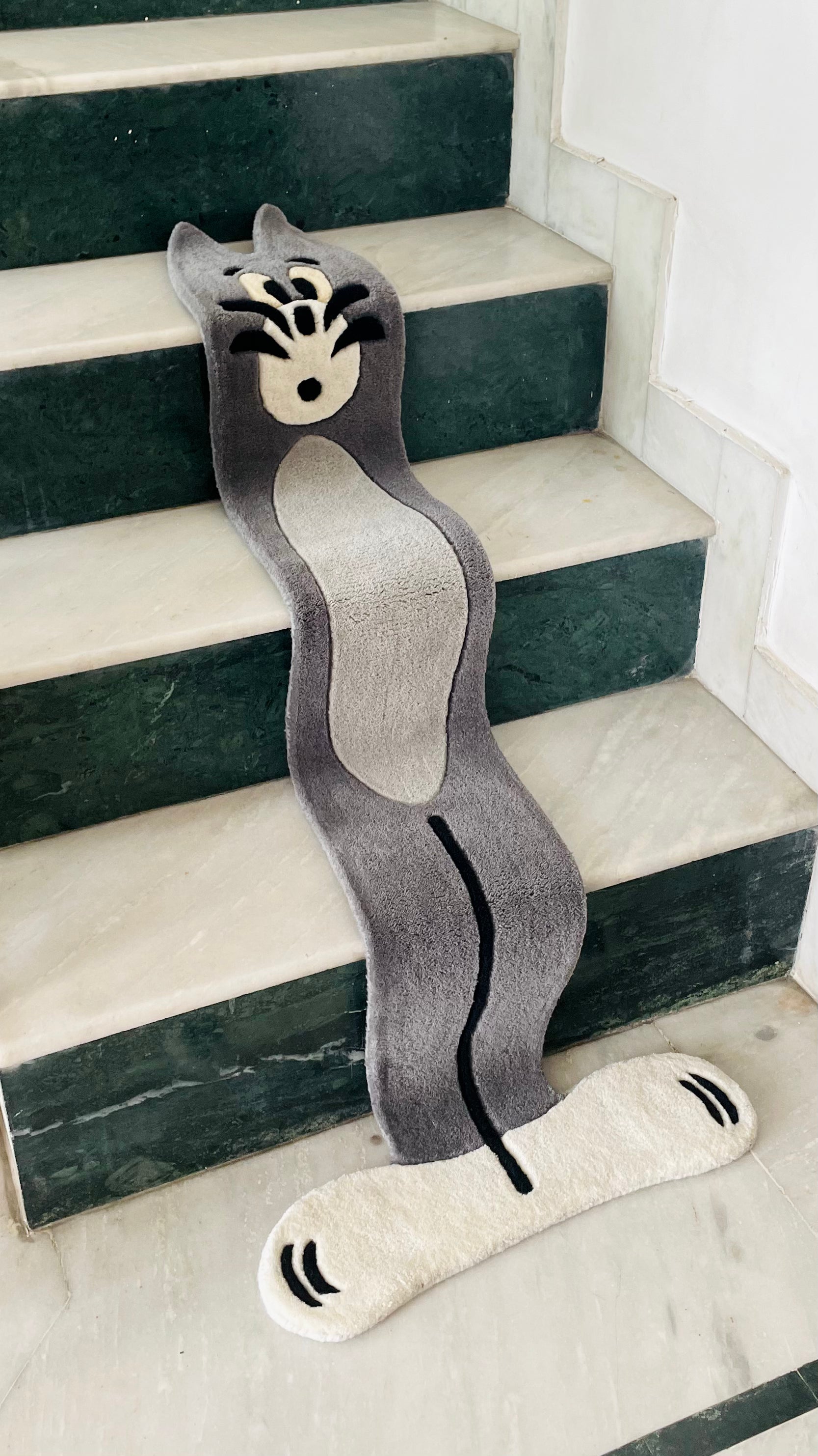 Flat Tom on Stairs Rug