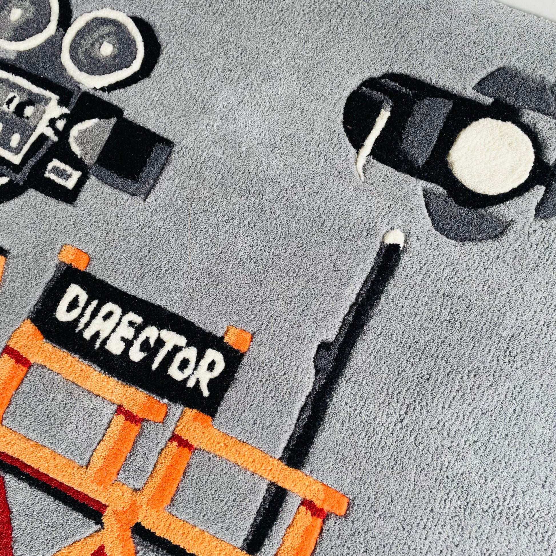 director set tufted rug close up