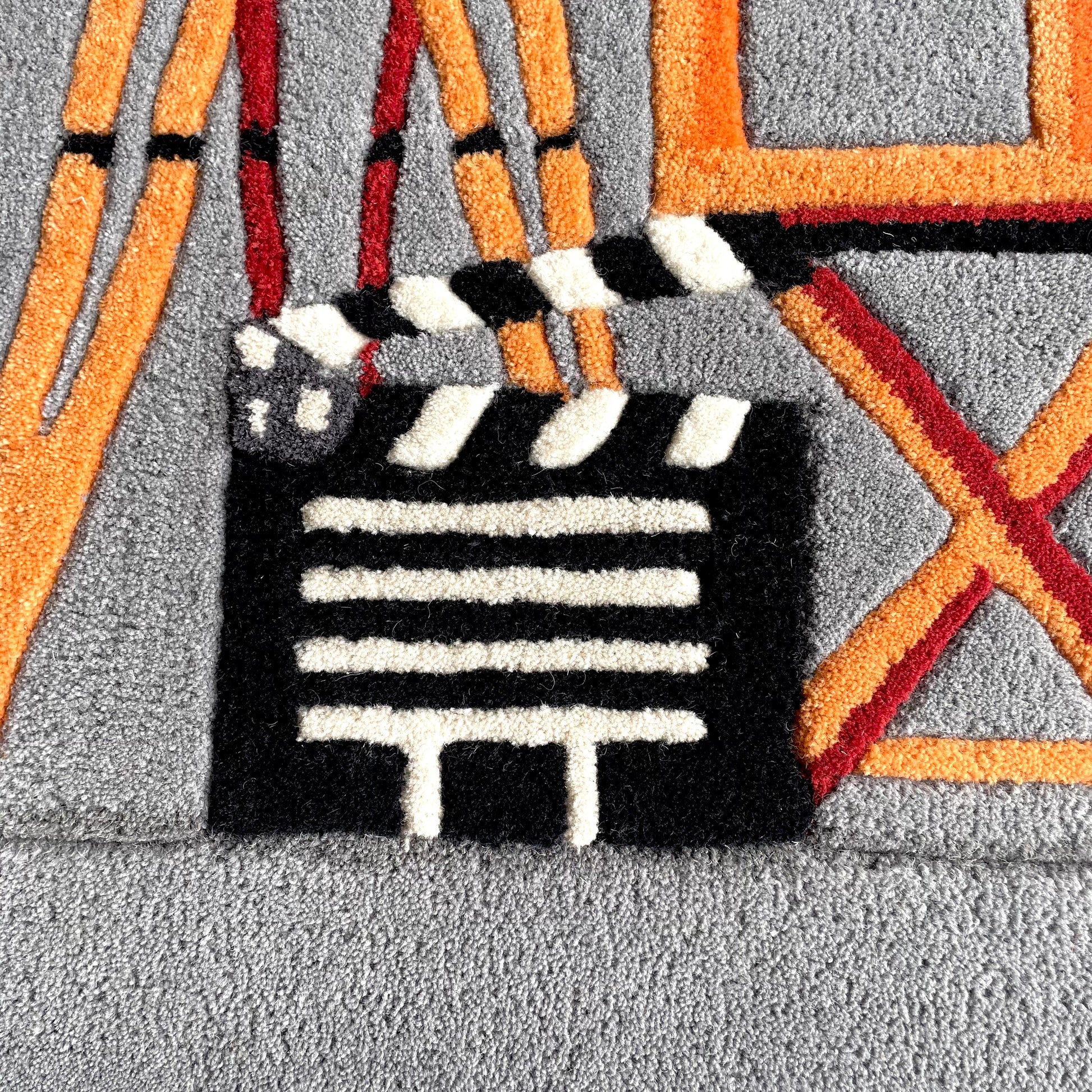 director set tufted rug close up