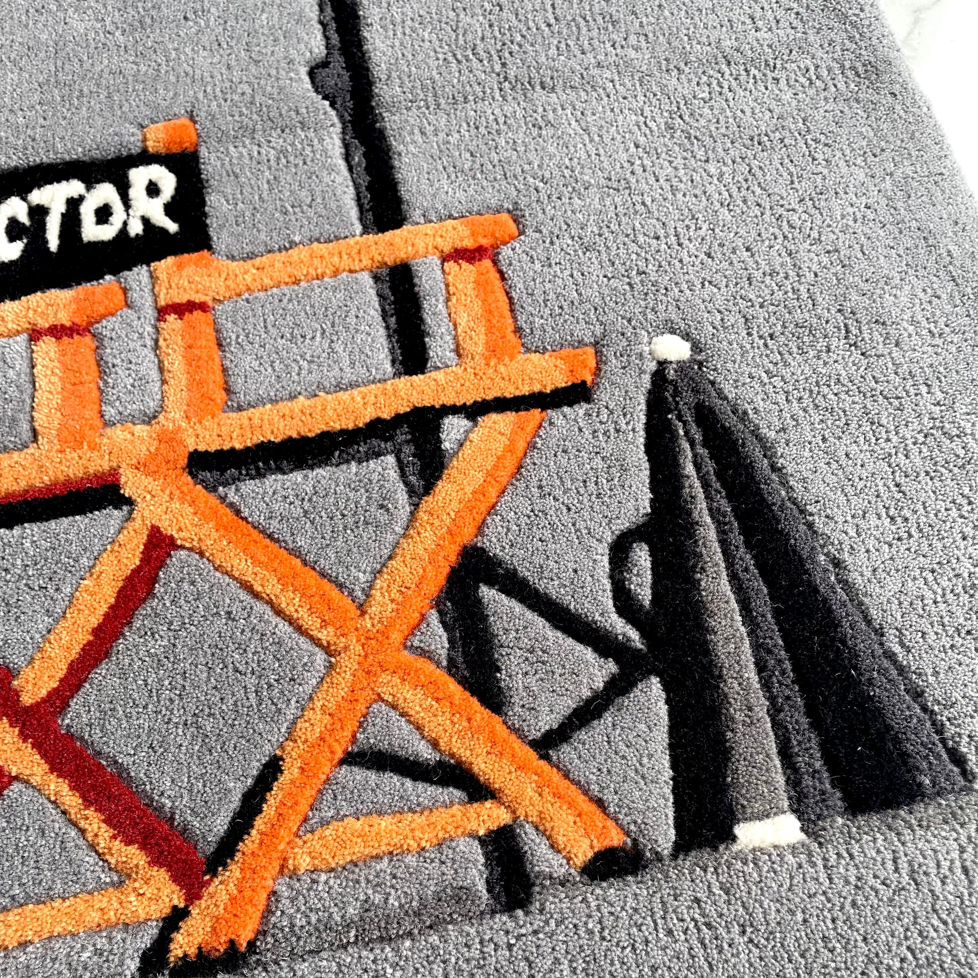 director set tufted rug close up